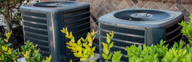 Energy efficient central air conditioner unit installed outside a San Diego CA home